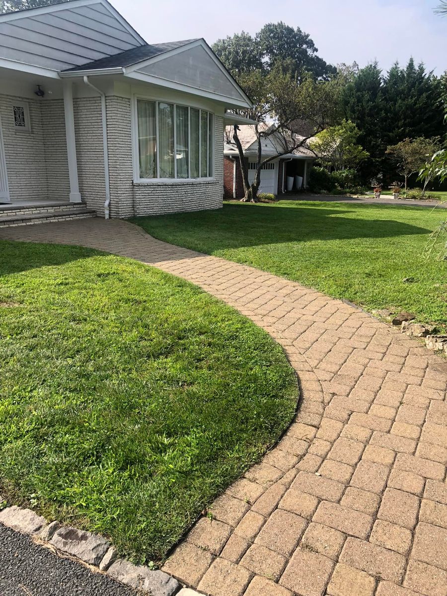 Mowing for Castro Landscaping in Orange, NJ