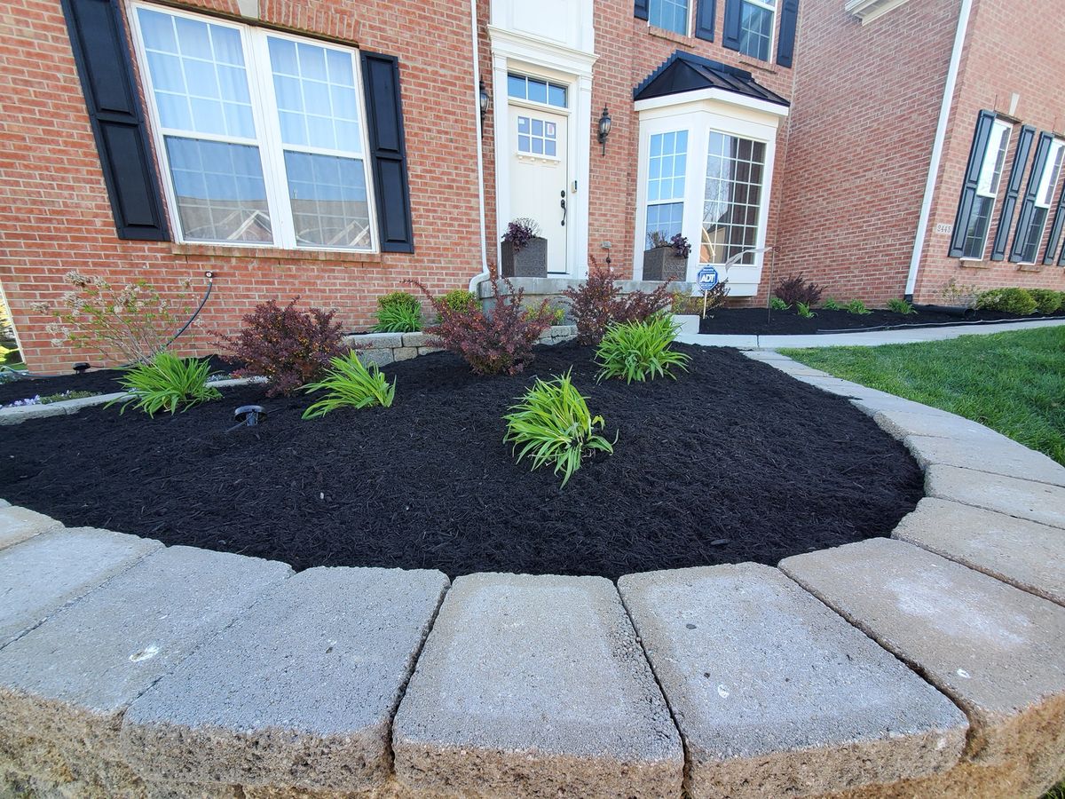 Mulching for Tingley's Green Land Services in Springfield, Ohio