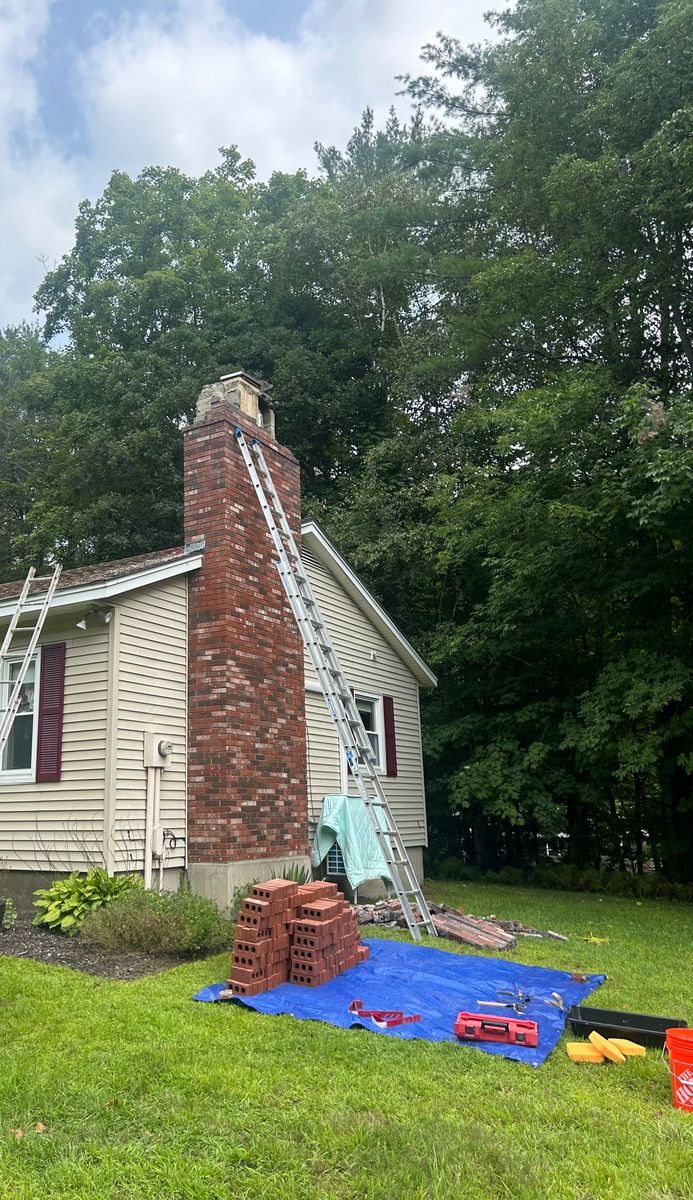 Chimney Rebuild for Boston Elite Roofing & Masonry in Somerville,  MA