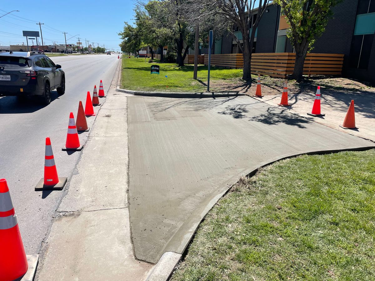 Commercial ADA Ramps, Sidewalk, Parking Bollards w/Signage, Curb/Gutter, Parking Lot Repair for Crete-Fleet in Abilene, TX