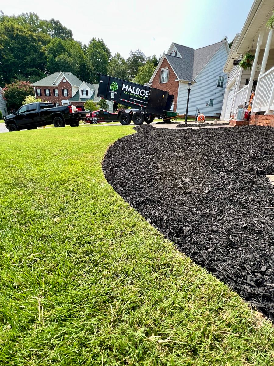 Mulch, River Rock and Pine Needle Installations for Malboeuf Landscaping, Inc in Kernersville, NC