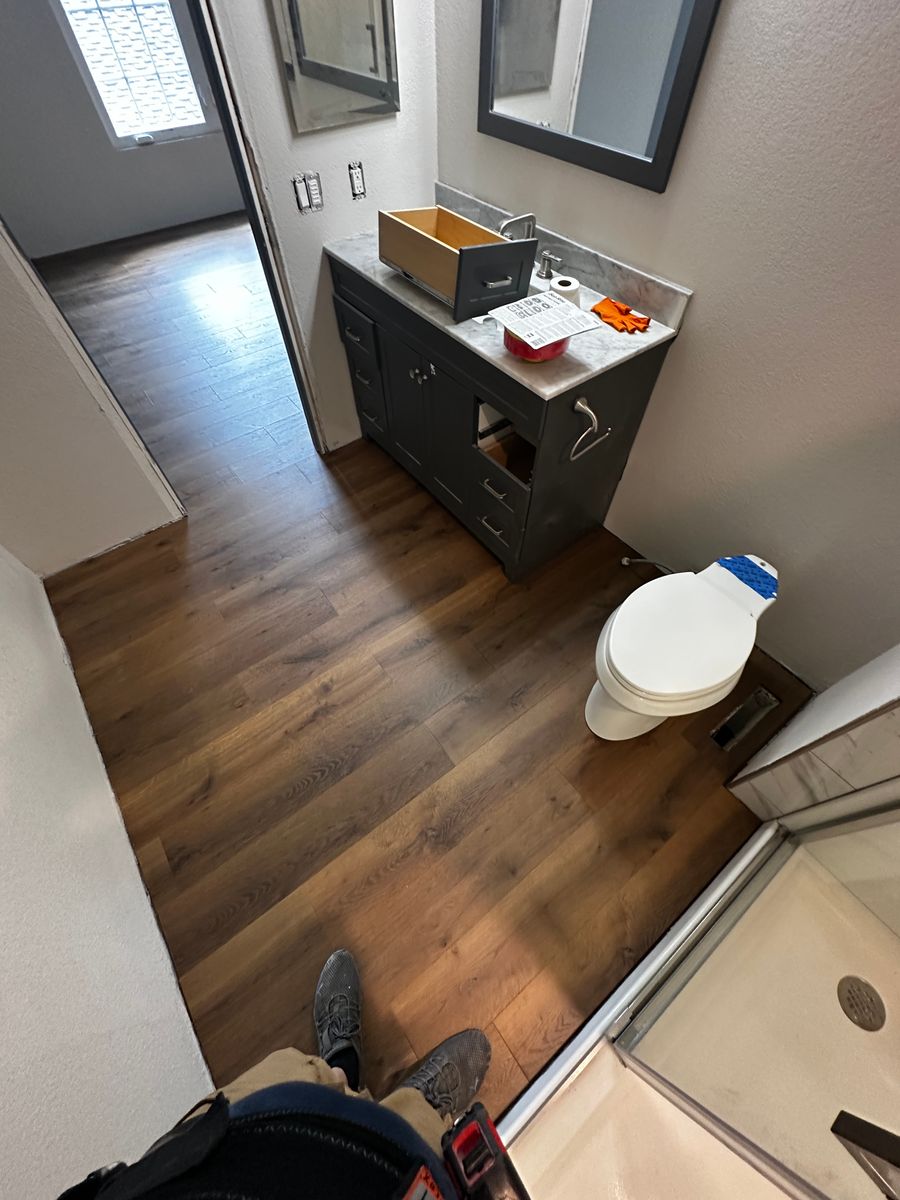 Floating Laminate Flooring and Luxury Vinyl Planks for Happy Home Projects Co-op in Lakewood, CO
