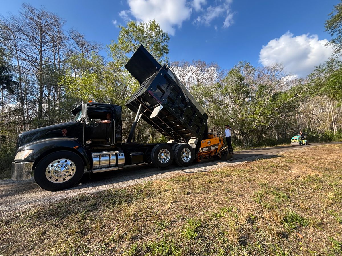 Asphalt Parking Lot Construction for Stanley & Sons Pavement in Naples, FL