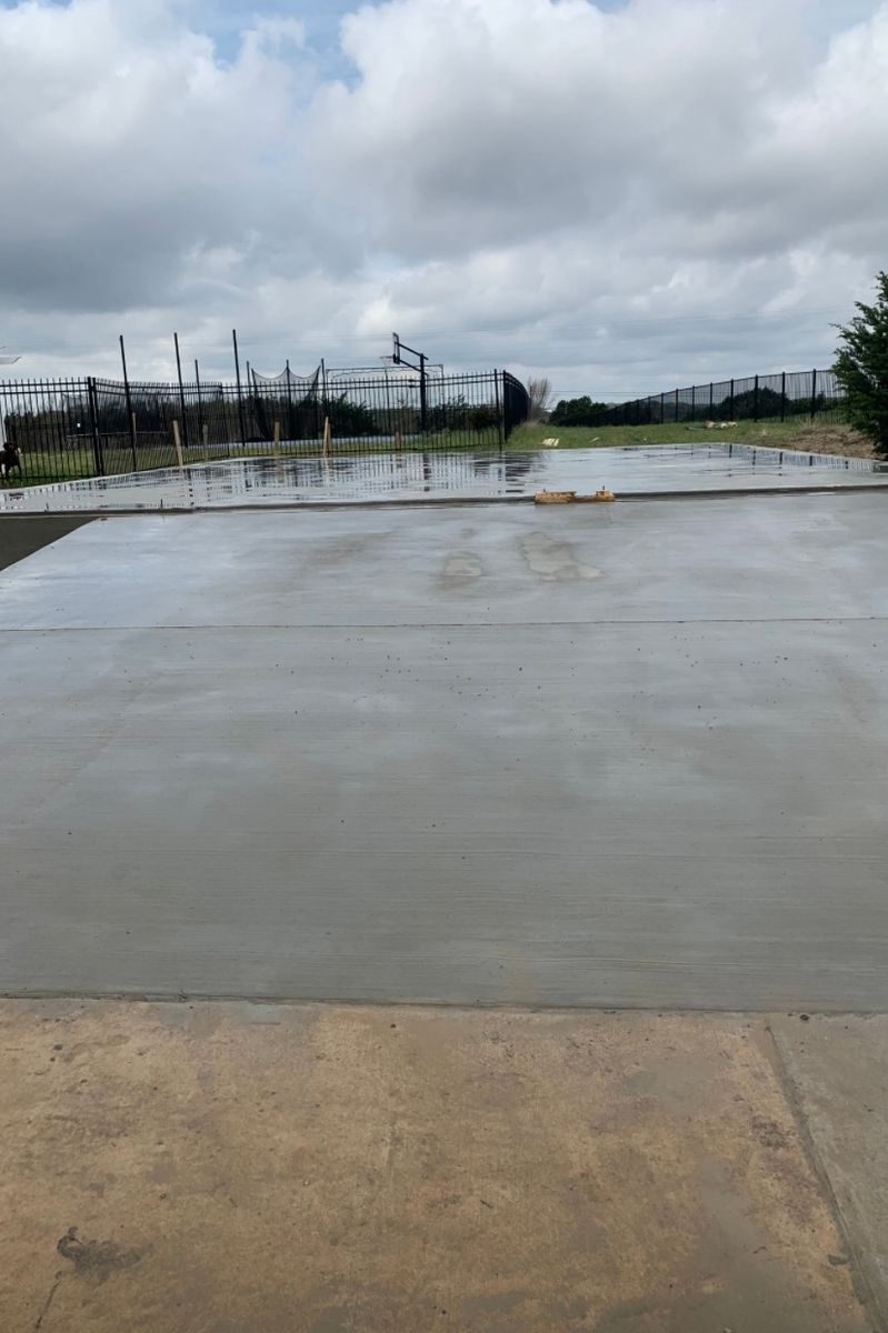 Concrete Driveway Installation for Leo's Concrete Crew in Elgin, TX