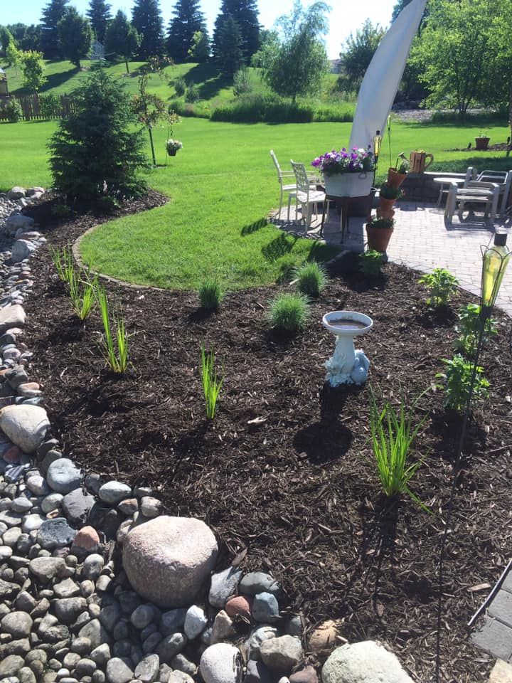 Mulch Installation for Keane Lawn Care & Snow Removal in Spring Lake Park, MN