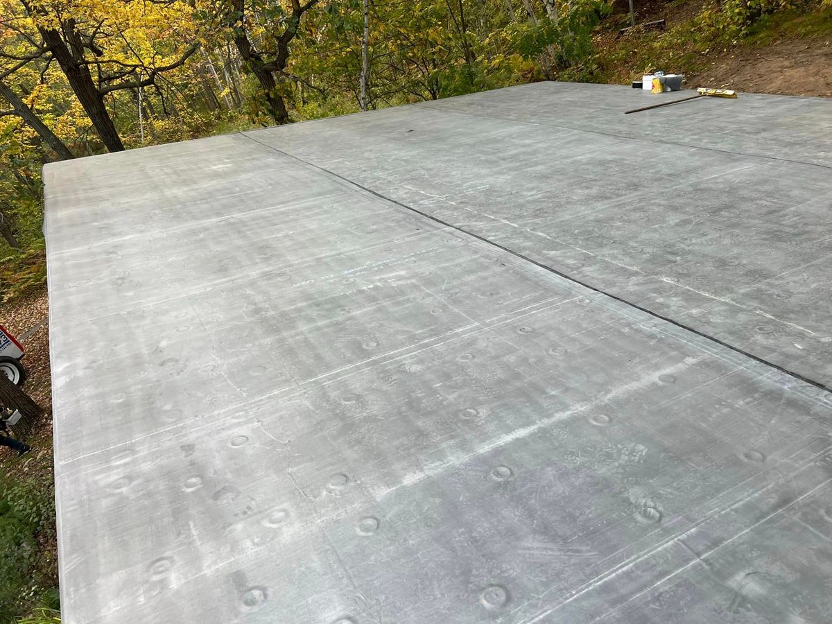 Low Slope EPDM Roofing Installation for Patriot Roofing Plus LLC in Pequot Lakes, MN