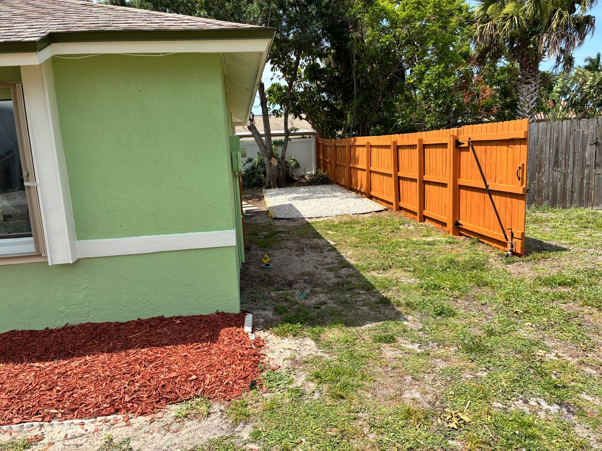 Fence Staining for Paps Painting in Brevard county, FL