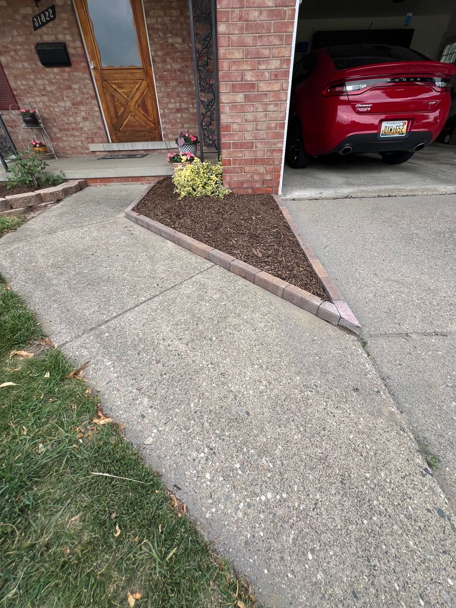 Decorative stone/Mulch Installation for Alltimate Outdoor Services in Warren, MI