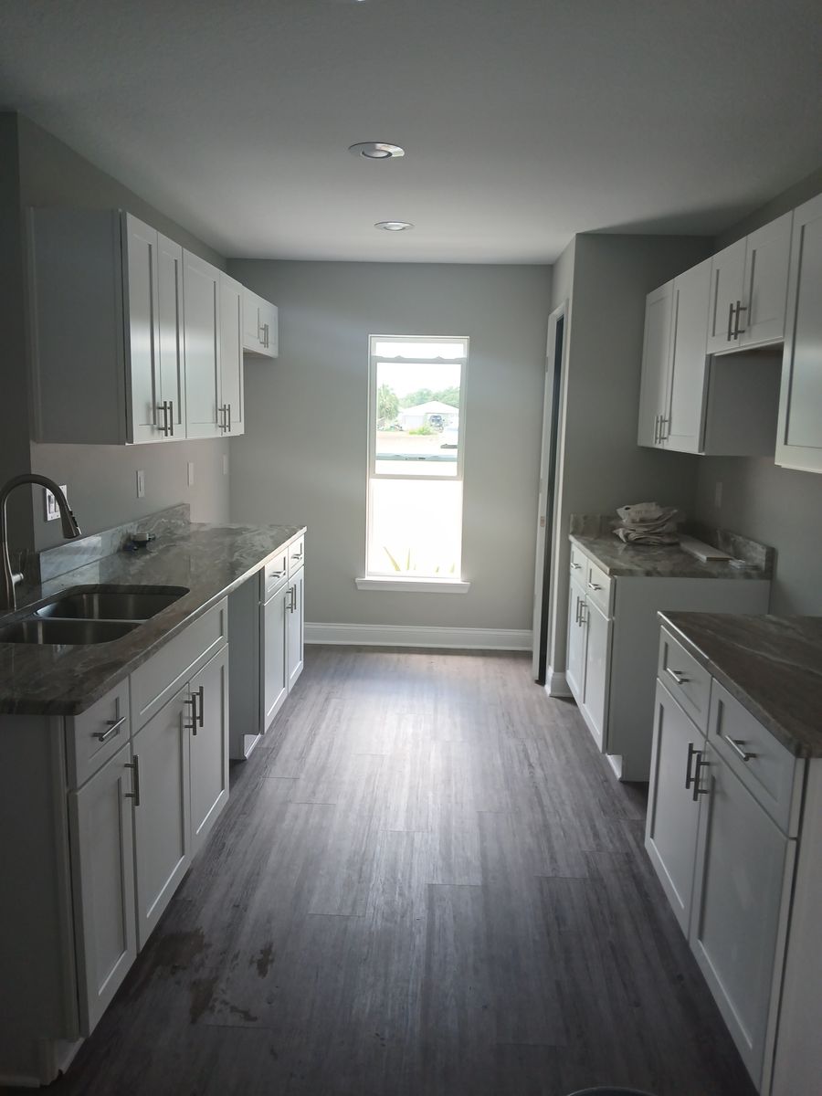 Kitchen installations and Cabinet refinishing for The Pro's Painting and Handyman Services in Haines CIty, FL