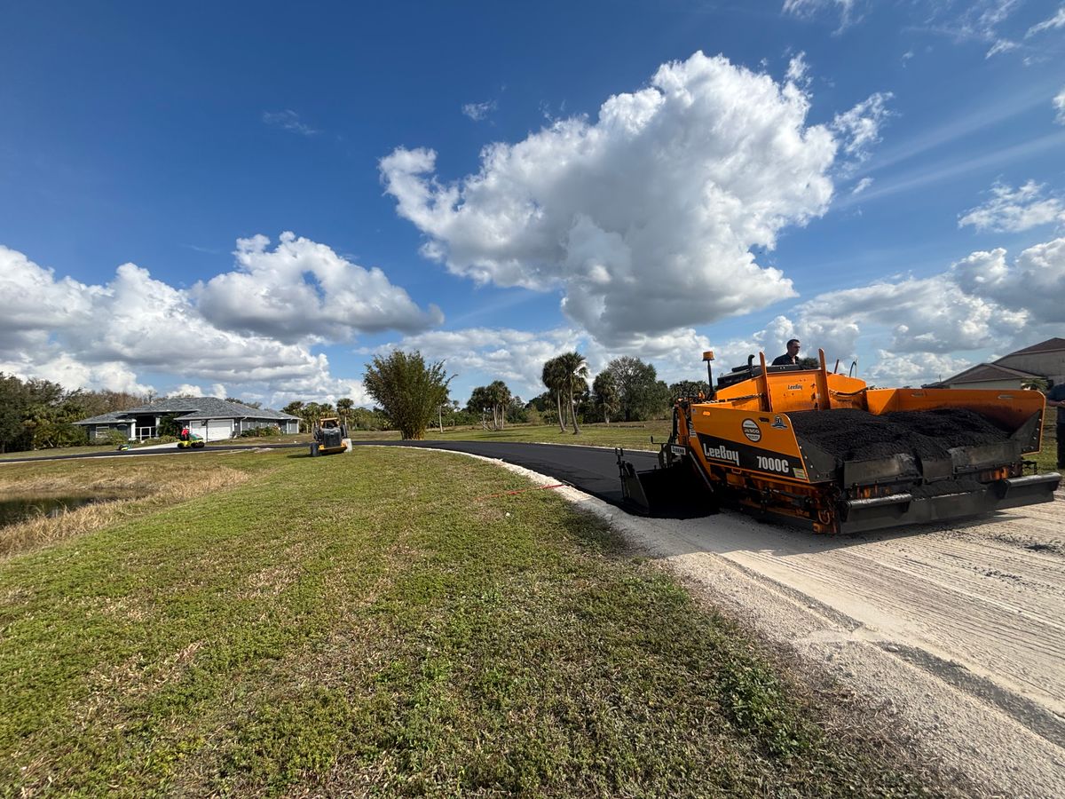 Asphalt Parking Lot Construction for Stanley & Sons Pavement in Naples, FL