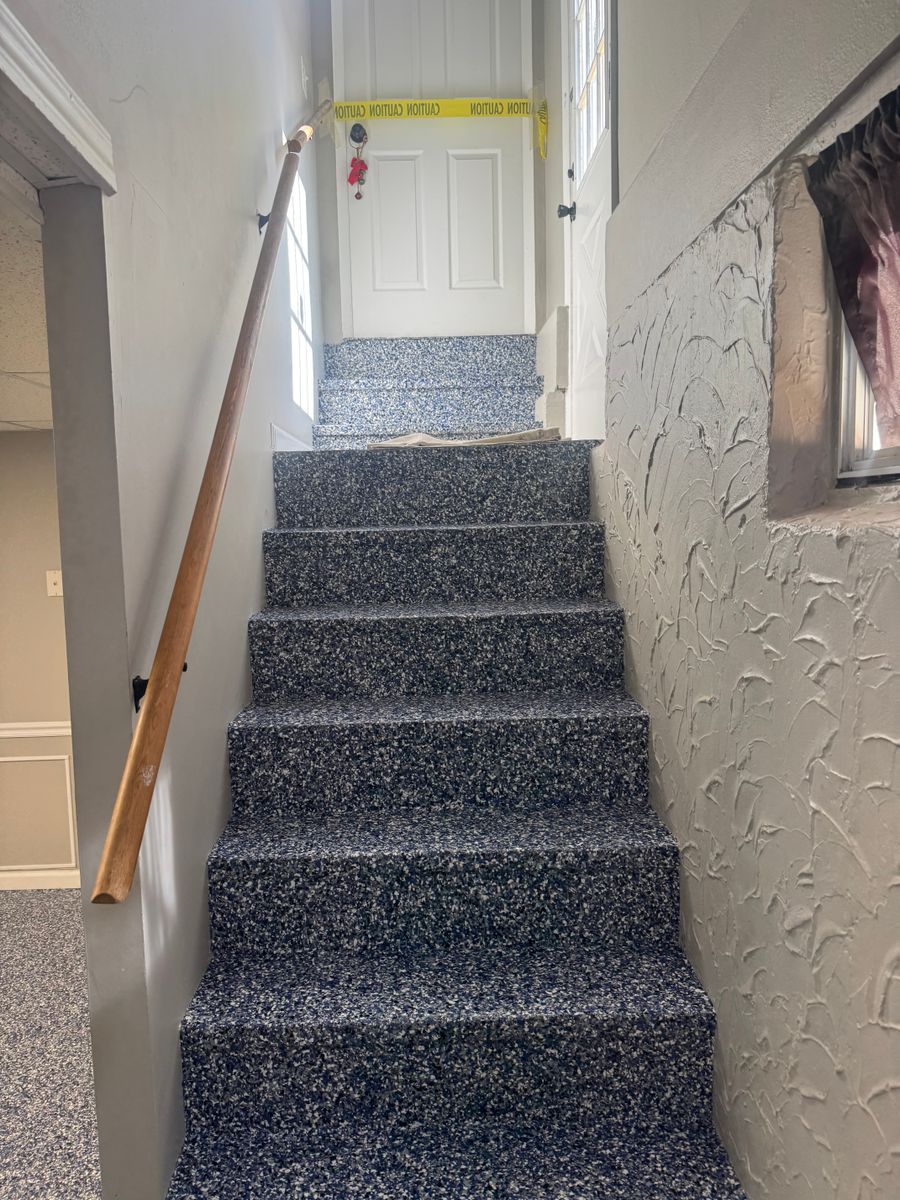 Installation of Beautiful Garage Floors for Drury Concrete Coatings in St. Charles, MO