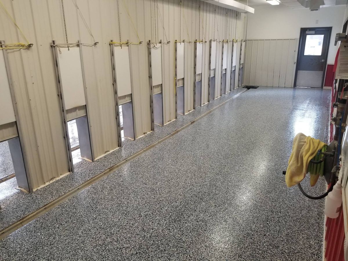 Ployaspartic Chip Coating for Majestic Concrete and Landscape in Cross Lake, MN