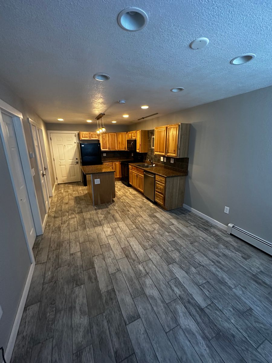 Floating Laminate, Wood, & Tile Installation for Happy Home Projects Co-op in Lakewood, CO