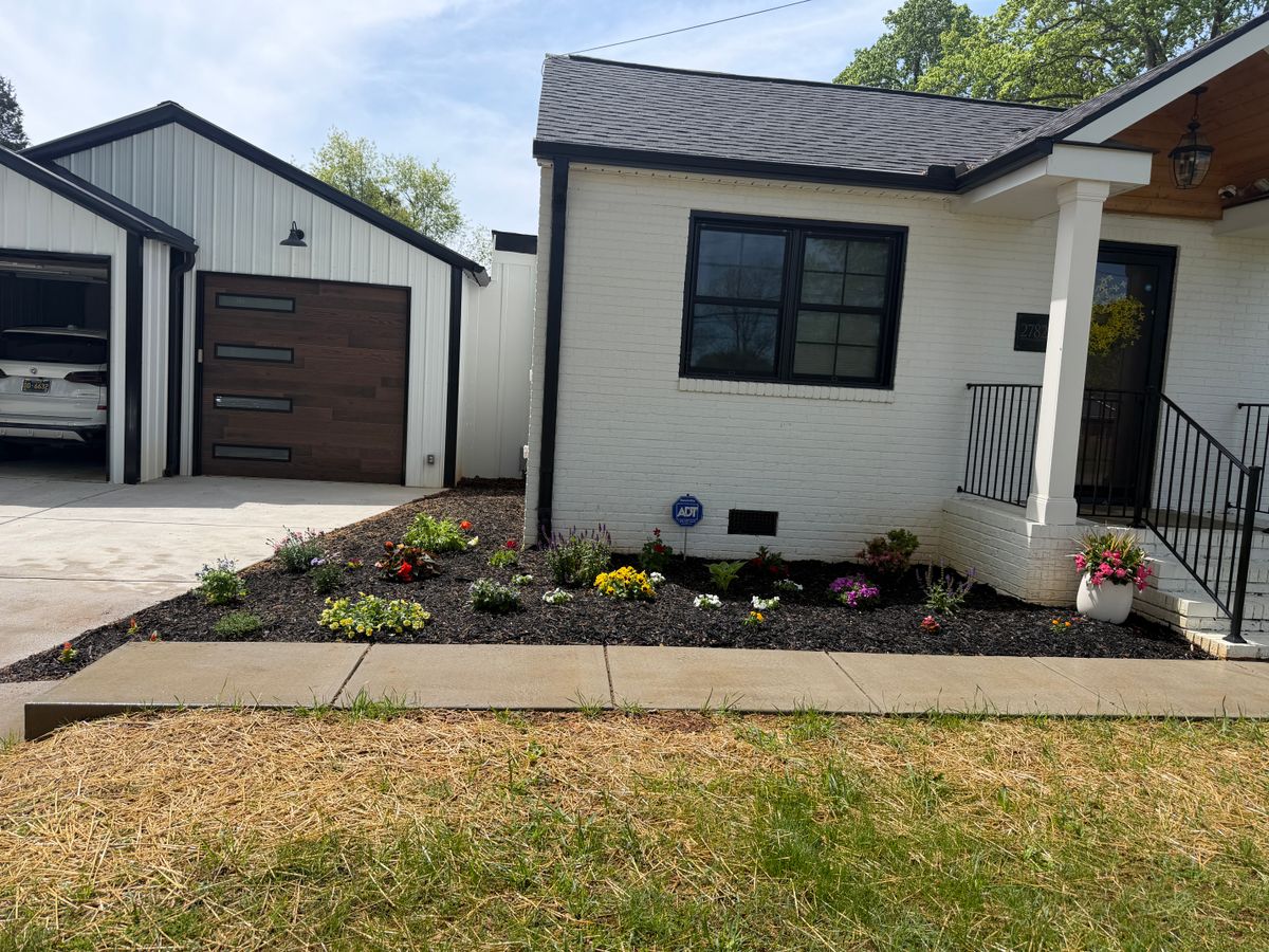 Mulching and pine needling for Holloway Yard Company in Winston-Salem, NC