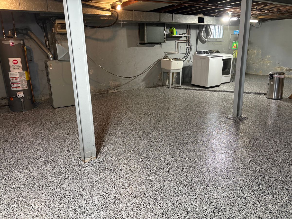 Installation of Beautiful Garage Floors for Drury Concrete Coatings in St. Charles, MO