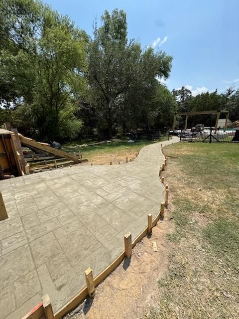 Stamped Concrete Installation for Benitez Brothers Construction in Austin, TX