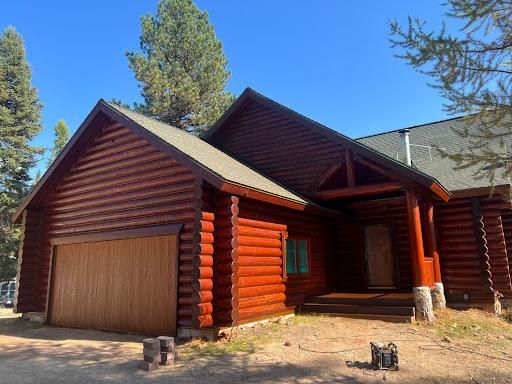 Log Home Staining in Montana for True Blue Logworks LLC in Corvallis, MT