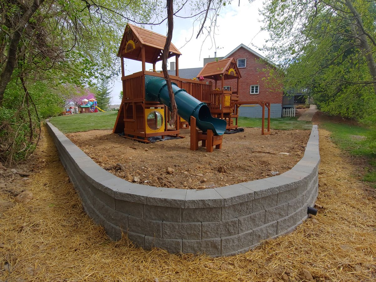 Retaining Wall Construction for VQ Land & Stone in St. Louis, MO