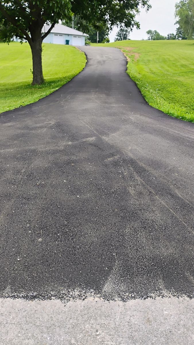 Asphalt Driveway Installation for Bishop Asphalt Sealcoating in Marceline, MO