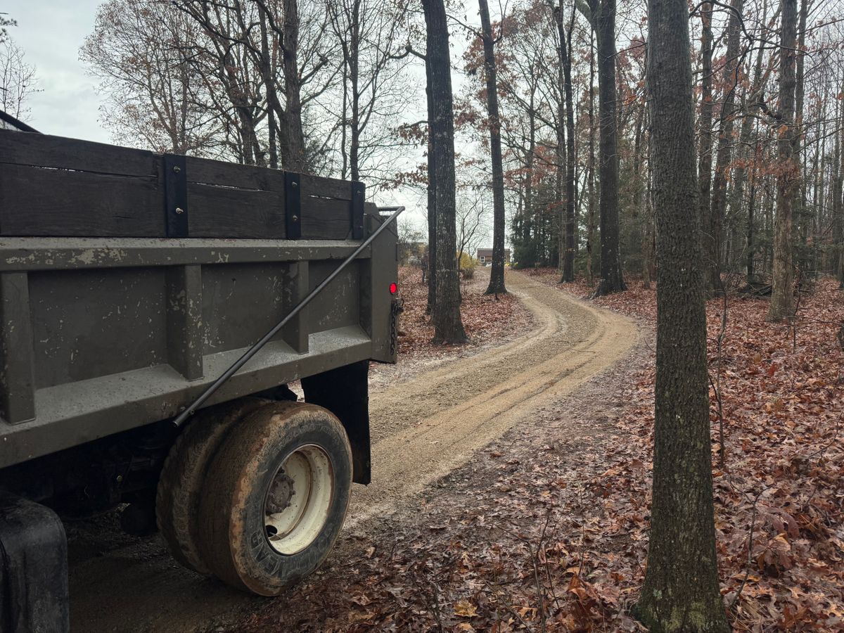 Gravel hauling and spreading for Under Grace Transport and Grading in Marble Hill, GA