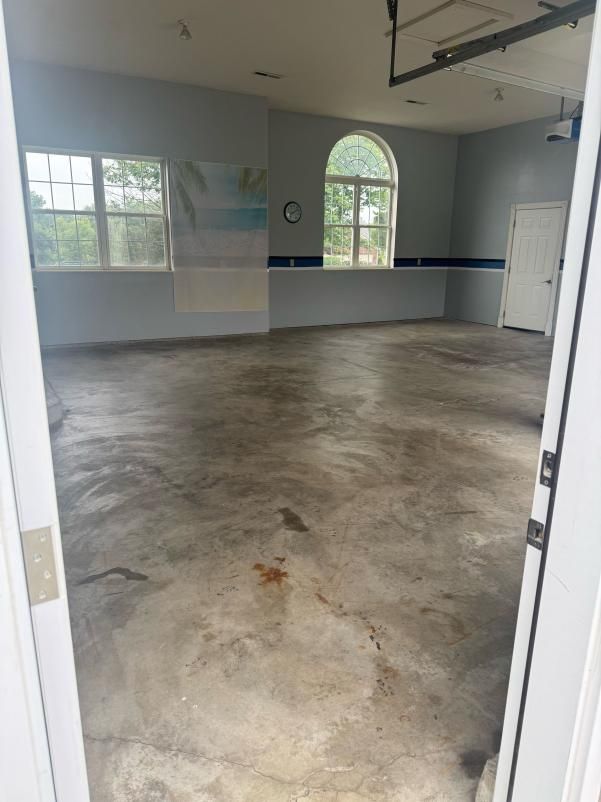 Installation of Beautiful Garage Floors for Drury Concrete Coatings in St. Charles, MO