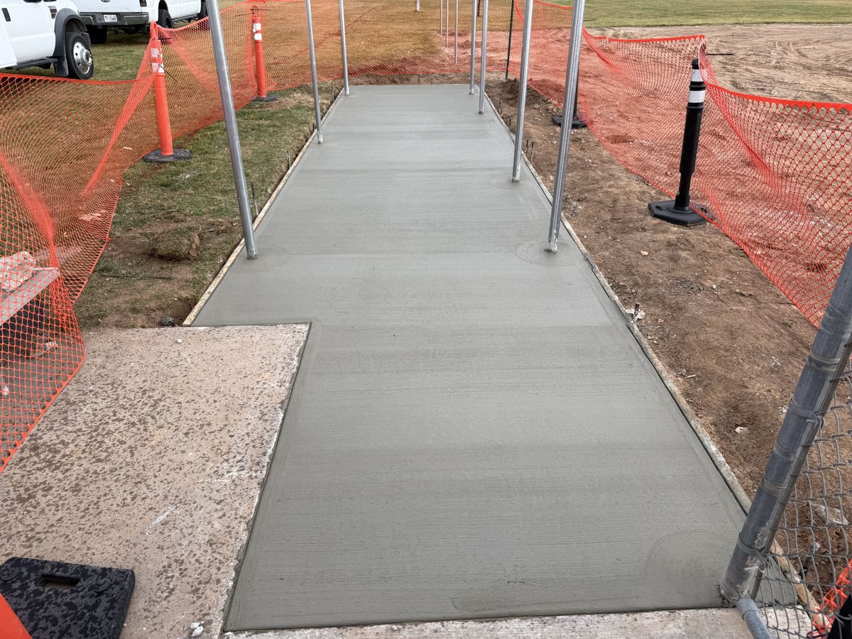 Sidewalk Installation for TNT Concrete and Construction in Roy, UT