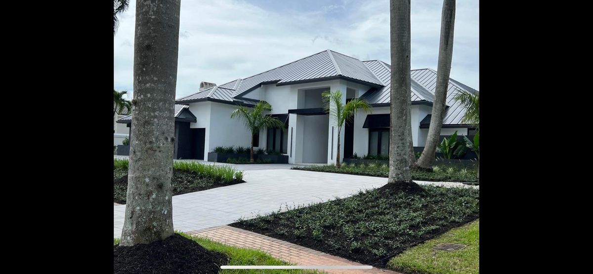 Patio Design & Construction for An Extravagant Landscape & Lawn Service in Delray, FL