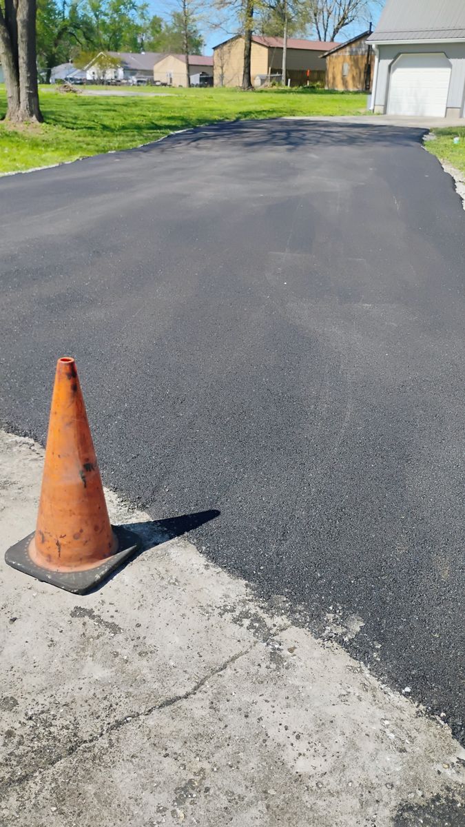 Asphalt Driveway Installation for Bishop Asphalt Sealcoating in Marceline, MO