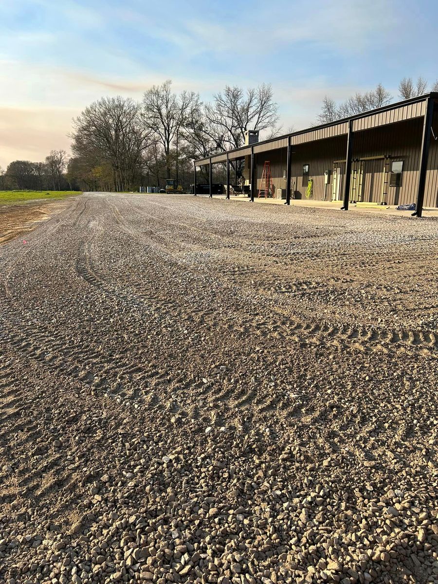 Limestone & Concrete Wash Installation for Lambert Equipment Services in Hessmer, LA