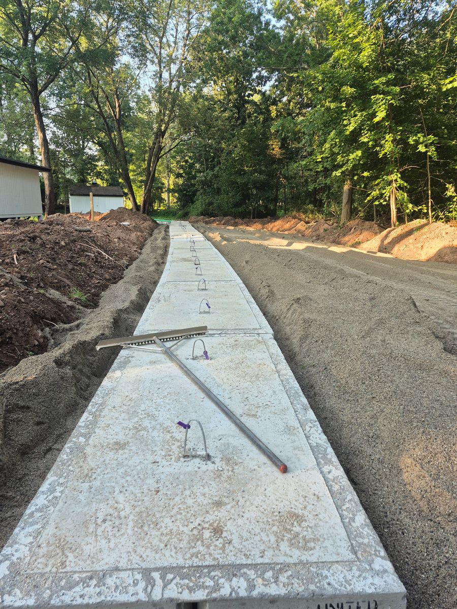Driveway Construction for Cody's Excavation and Septic in Plainville, CT