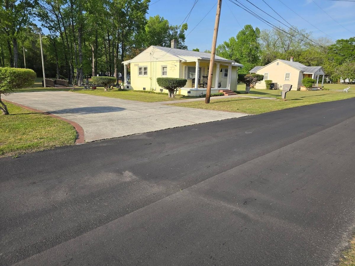 Walkway and driveway cleanup for Just Mow and Go Lawn Service, LLC in New Bern, NC