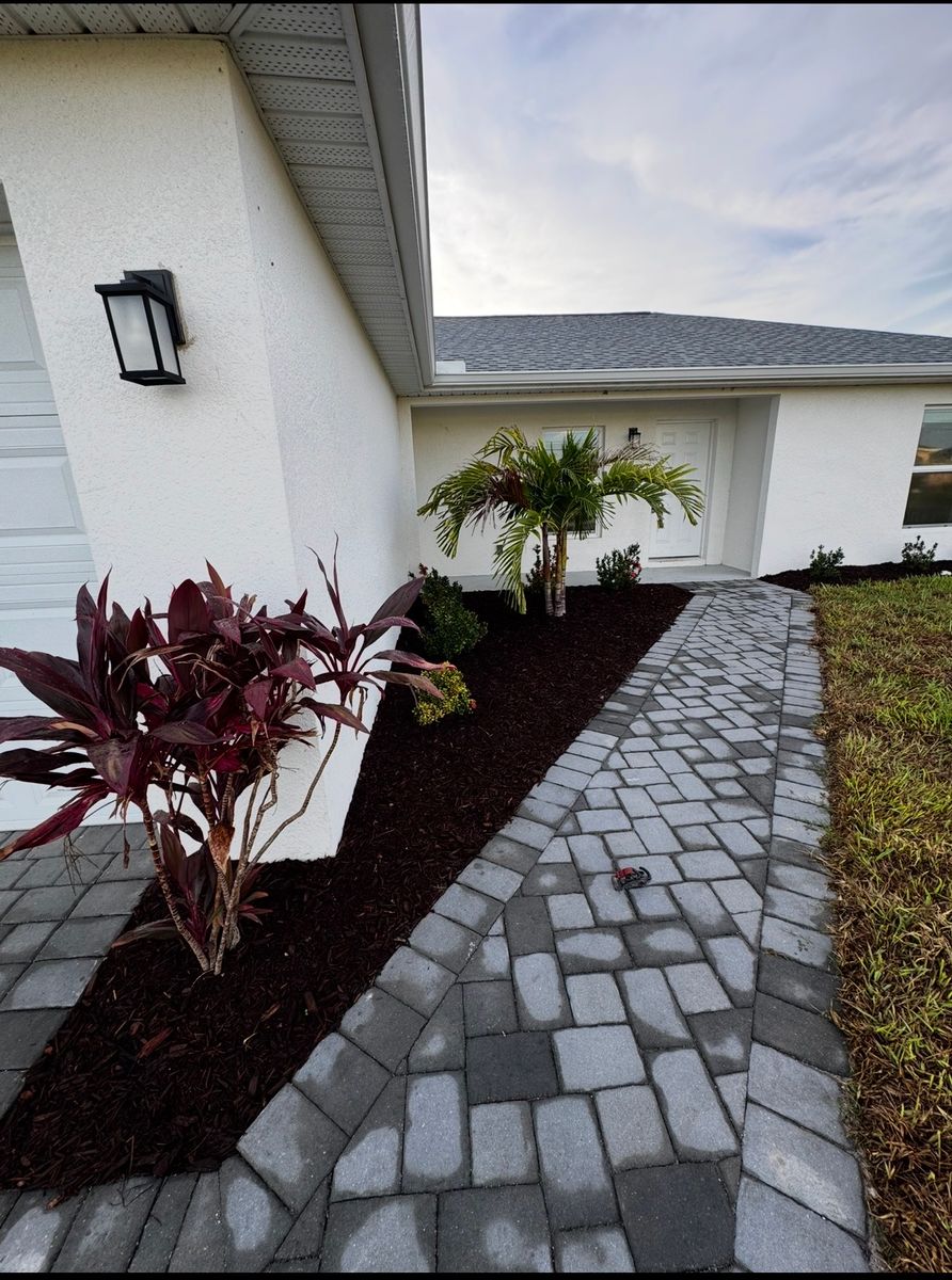 Mulch and rocks installation for BH Lawn & Landscape in LaBelle, FL