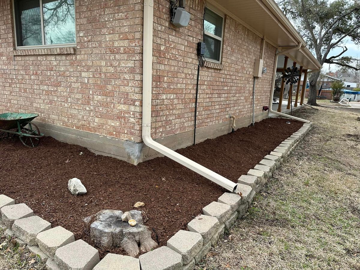 Mulch Installation for Allen Lawn Care in Taylor, Texas