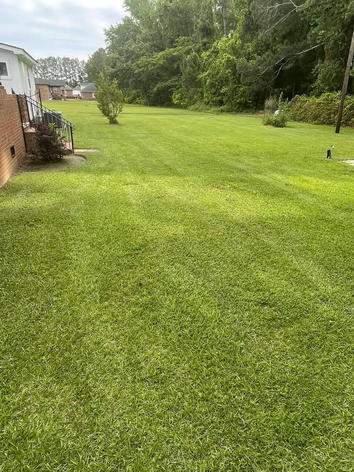 Lawn Maintenance for Trinity Landscapes  in Lumberton, NC
