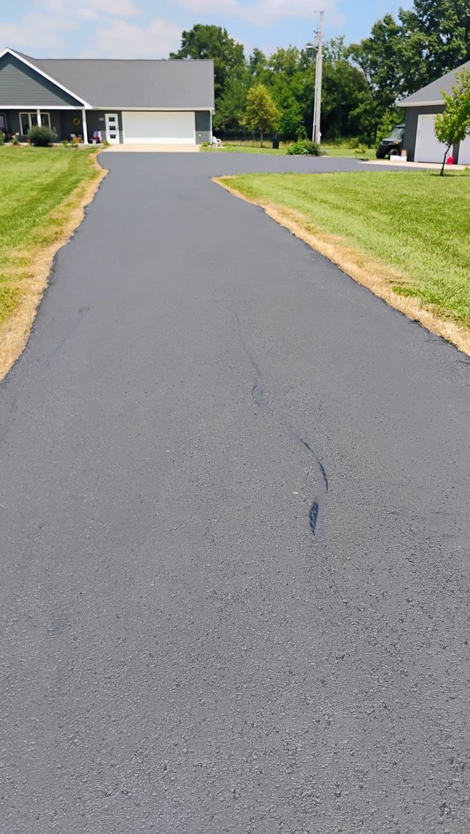 Asphalt Driveway Installation for Bishop Asphalt Sealcoating in Marceline, MO
