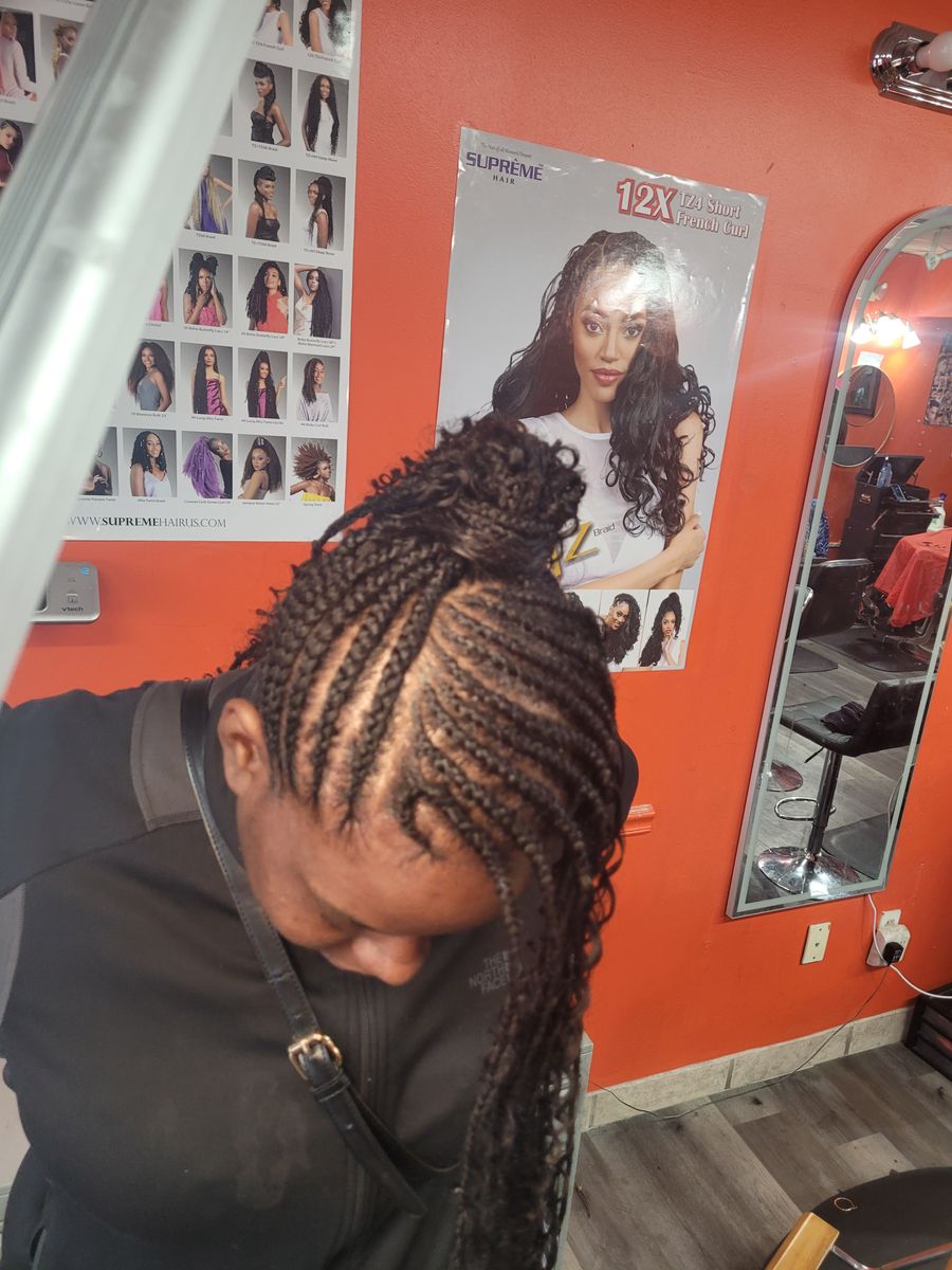 Haircuts for Pascy Hair Braiding Salon & Barber Shop in Baltimore, MD