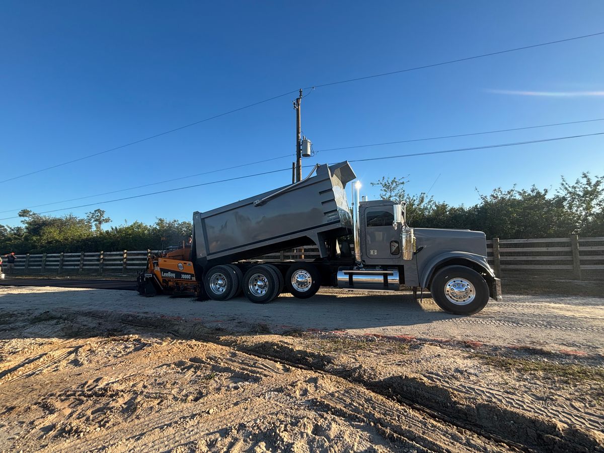 Asphalt Parking Lot Construction for Stanley & Sons Pavement in Naples, FL