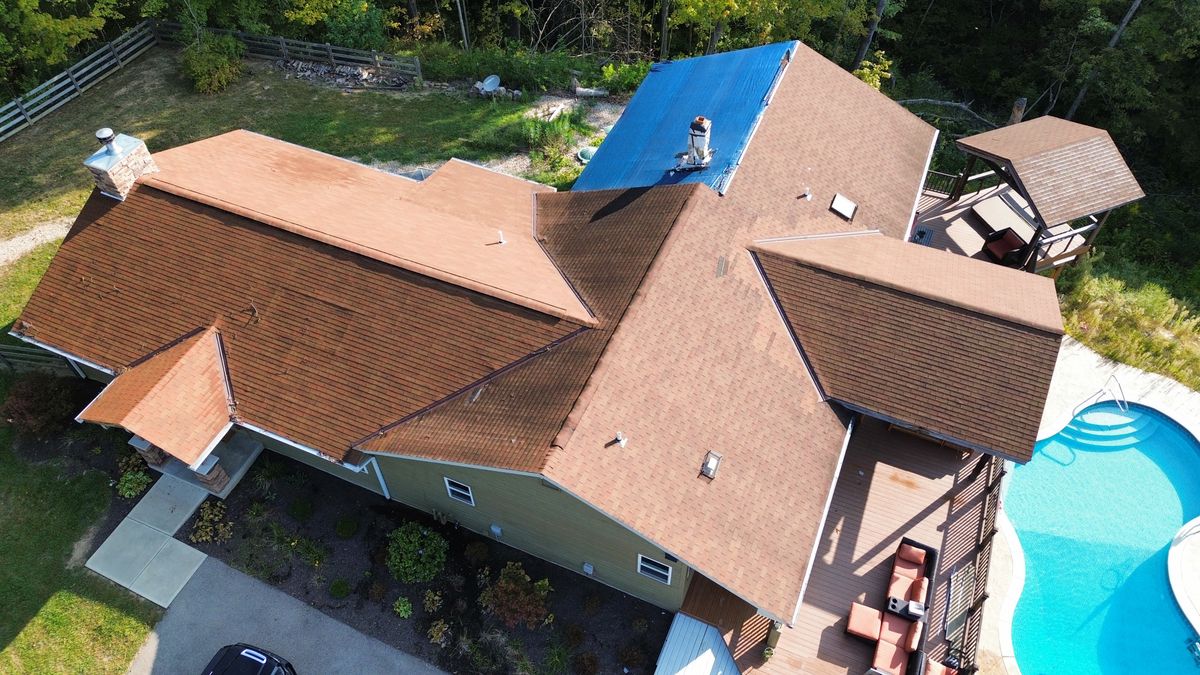 Roof inspection for Precious Roofing in Madeira, OH