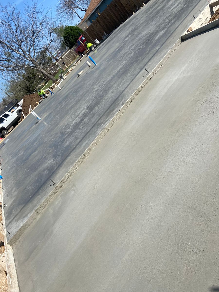 Concrete Driveway Installation for Leo's Concrete Crew in Elgin, TX