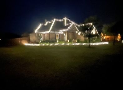 Custom Christmas lights for Teague Trees & Landscaping in Rendon, TX