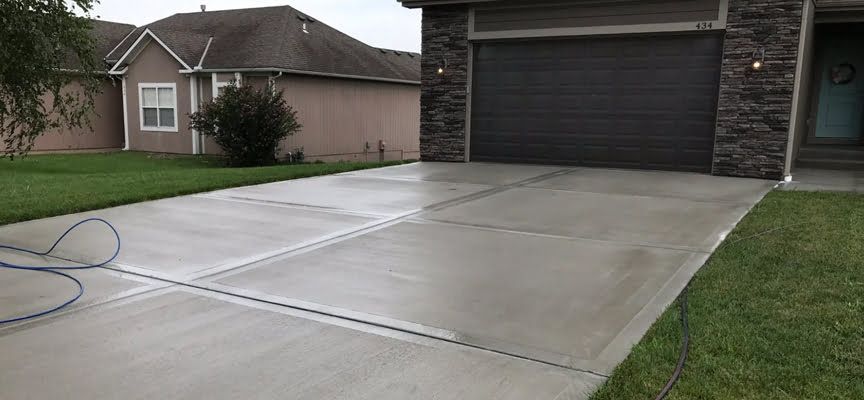 Concrete Driveway Installation for Red Agave Landscape Build & Design in Houston, TX