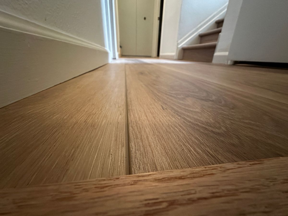 Floating Laminate Flooring and Luxury Vinyl Planks for Happy Home Projects Co-op in Lakewood, CO