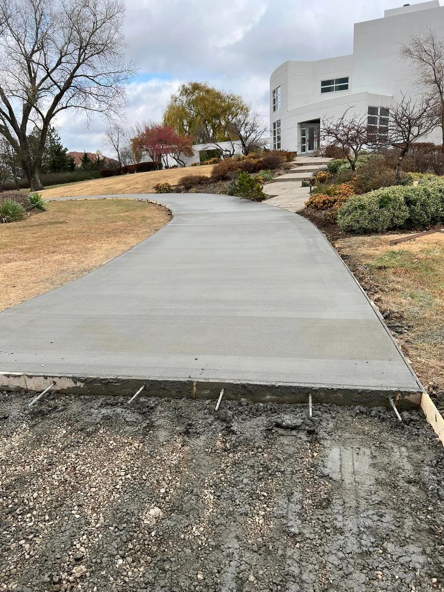 Sidewalk Installation for Travis Hill Concrete & Construction in Topeka, KS