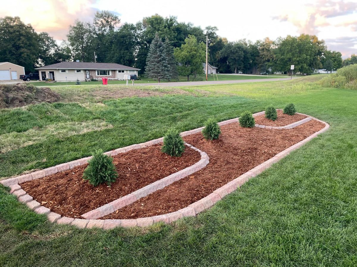 Mulch Installation for Second Nature Landscaping in Lake City, Minnesota