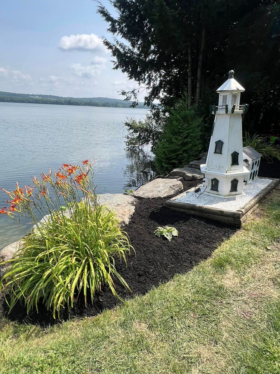 Flower Bed Restoration and Mulching for Bishop’s Property Maintenance in Franklin, VT