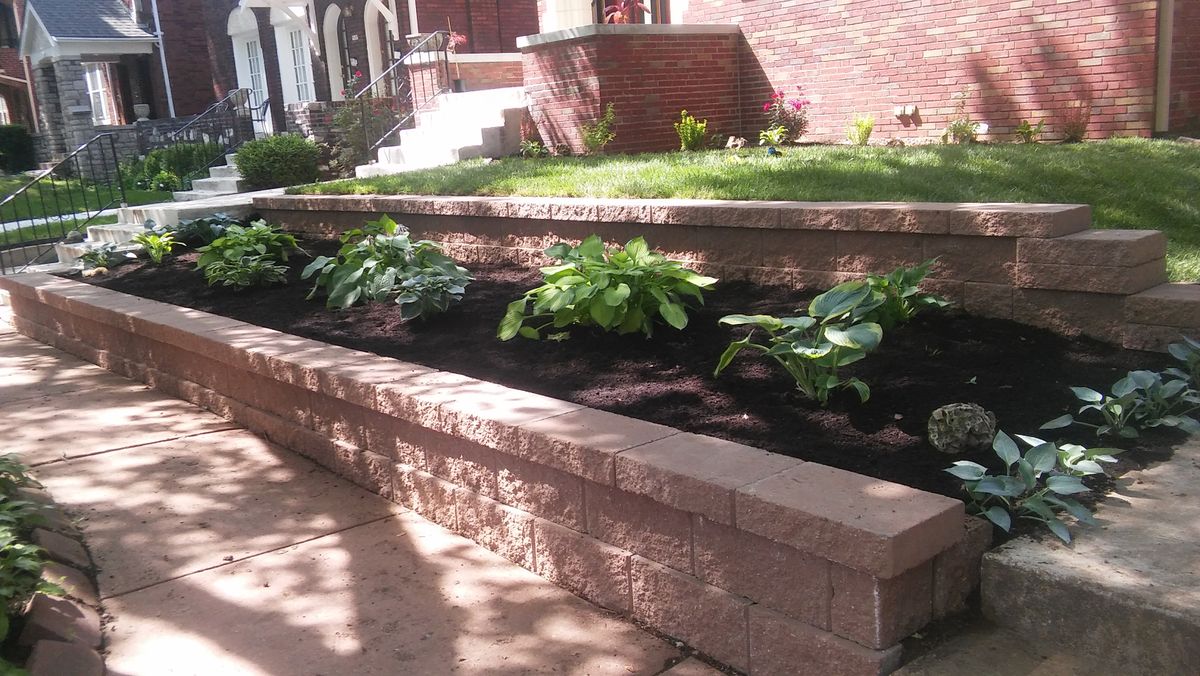 Mulch Installation for VQ Land & Stone in St. Louis, MO