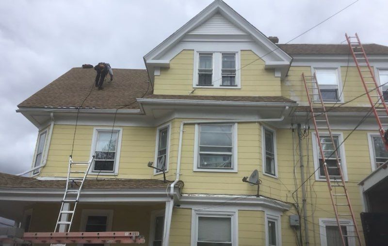 Roofing Installations and Replacements for Rainguard Masonry and Roofing in Lowell, MA
