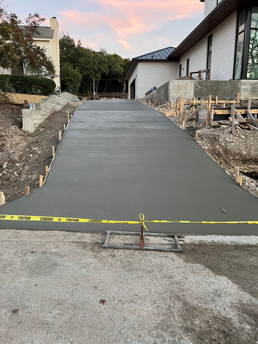 Concrete Driveway Installation for Leo's Concrete Crew in Elgin, TX