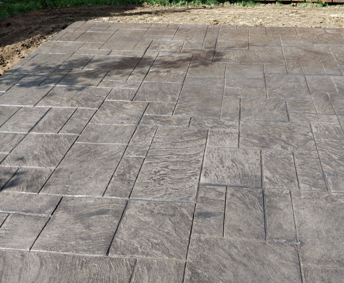 Stamped Concrete Installation for STAMPEDE Vertical Concrete in Isanti, Minnesota