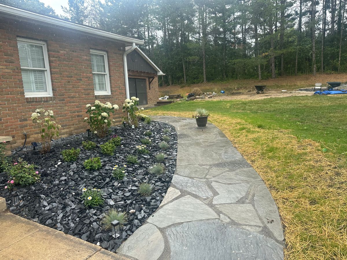 Flagstone Walkway Installation for Higgins landscaping LLC in West Jefferson, OH